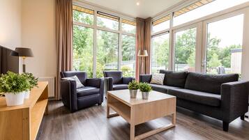 Deluxe House (For 5) | Living room | 40-inch TV with cable channels