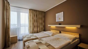 Deluxe Double Room, 1 Bedroom, Balcony, Garden Area | Minibar, in-room safe, desk, soundproofing