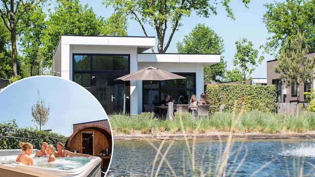 Un edificio moderno con amplios ventanales, un patio con zona de estar al aire libre y un jacuzzi.