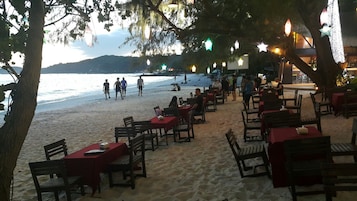 On the beach, white sand, beach towels, scuba diving