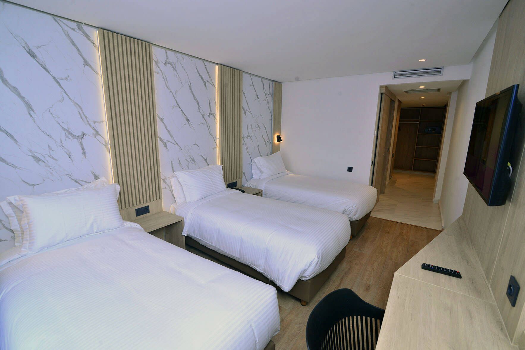 superior triple room | premium bedding, minibar, in-room safe, desk