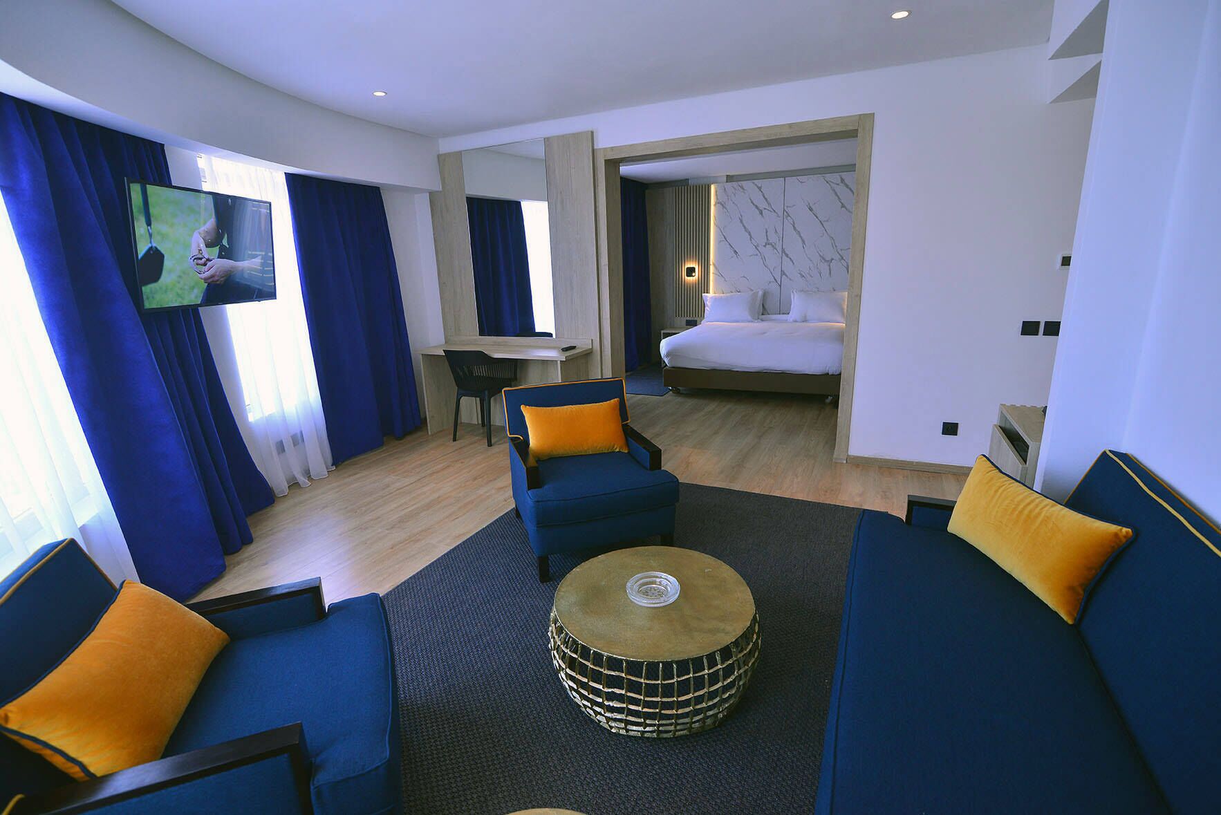 junior suite | living area | 42-inch flat-screen tv with satellite channels, tv