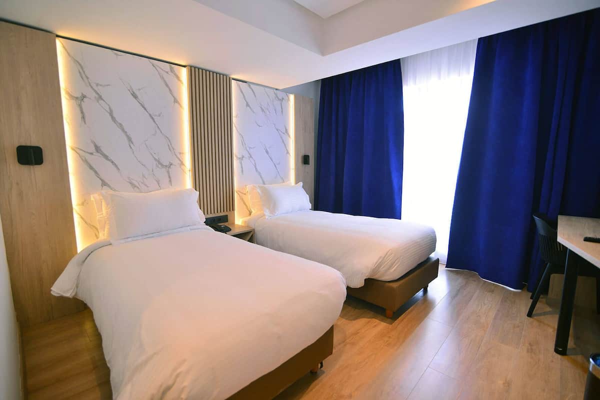 superior twin room | premium bedding, minibar, in-room safe, desk