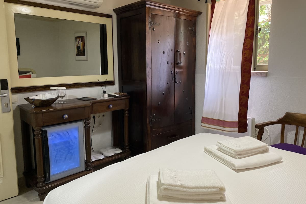 Standard Double Room (Underground) | Minibar, in-room safe, individually decorated, individually furnished