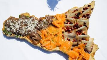A variety of food items arranged on a plate.