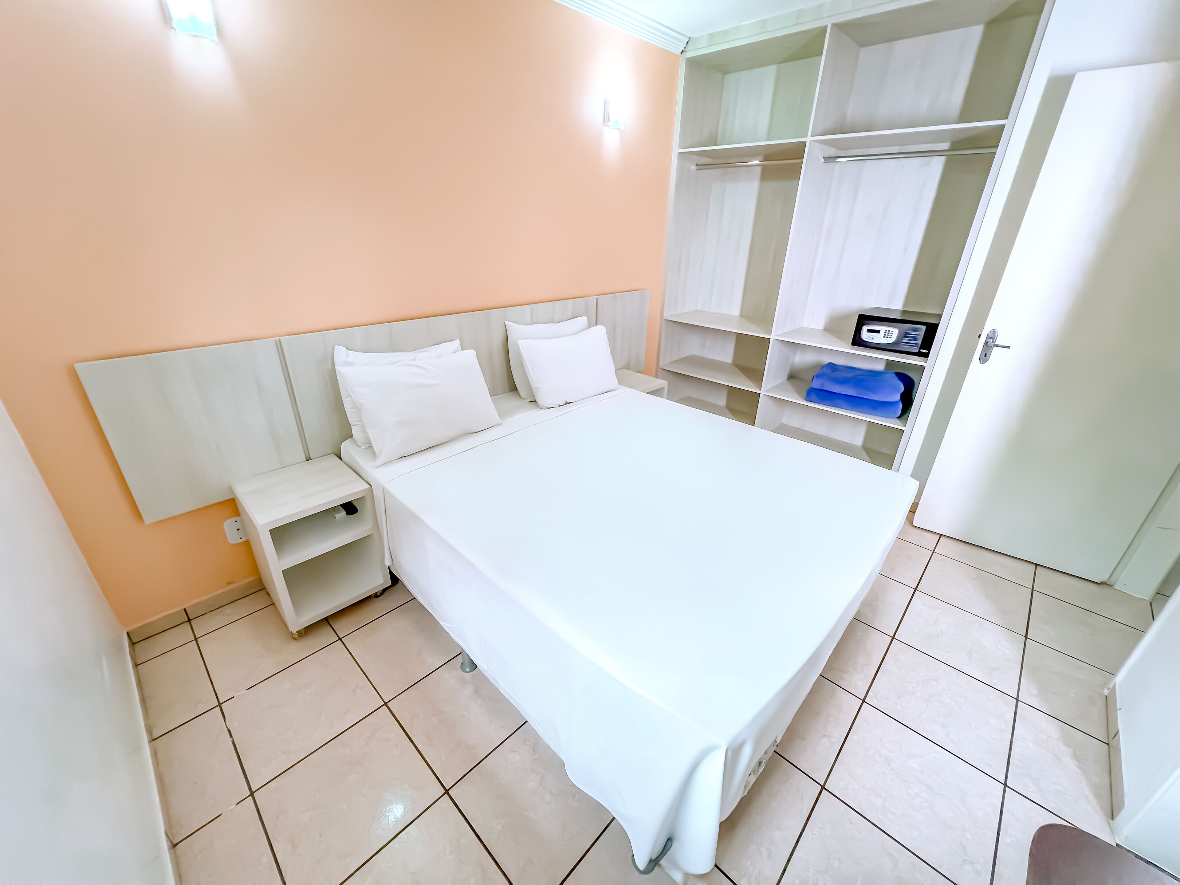 Standard Quadruple Room | Minibar, in-room safe, desk, blackout drapes