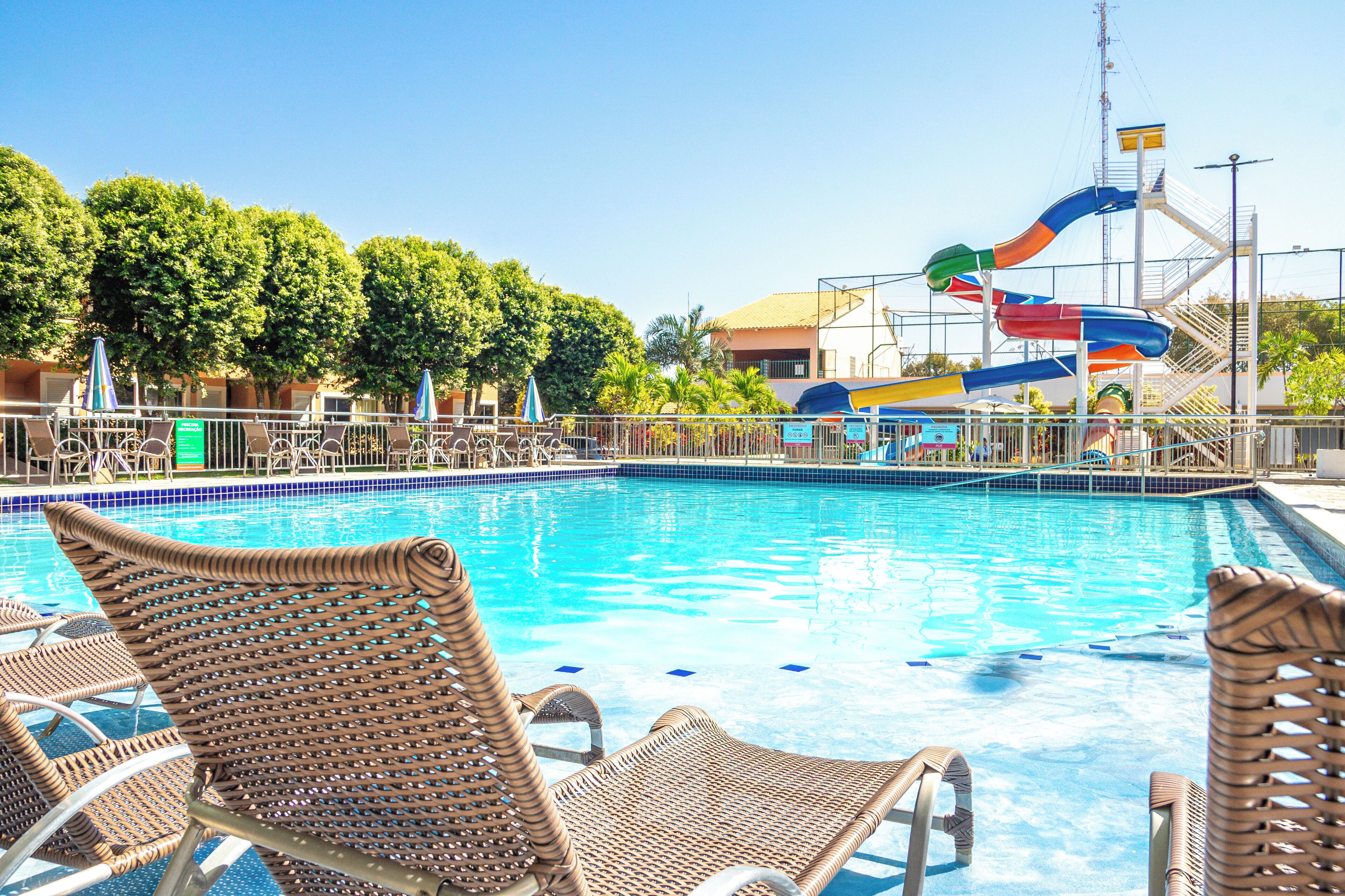 6 outdoor pools, a waterfall pool, pool umbrellas, sun loungers