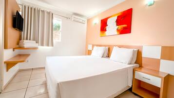 Suíte standard | Frigobar, cofres nos quartos, cortinas blackout