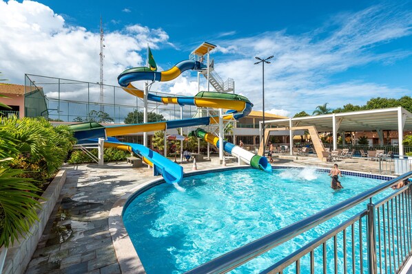 6 outdoor pools, a waterfall pool, pool umbrellas, sun loungers