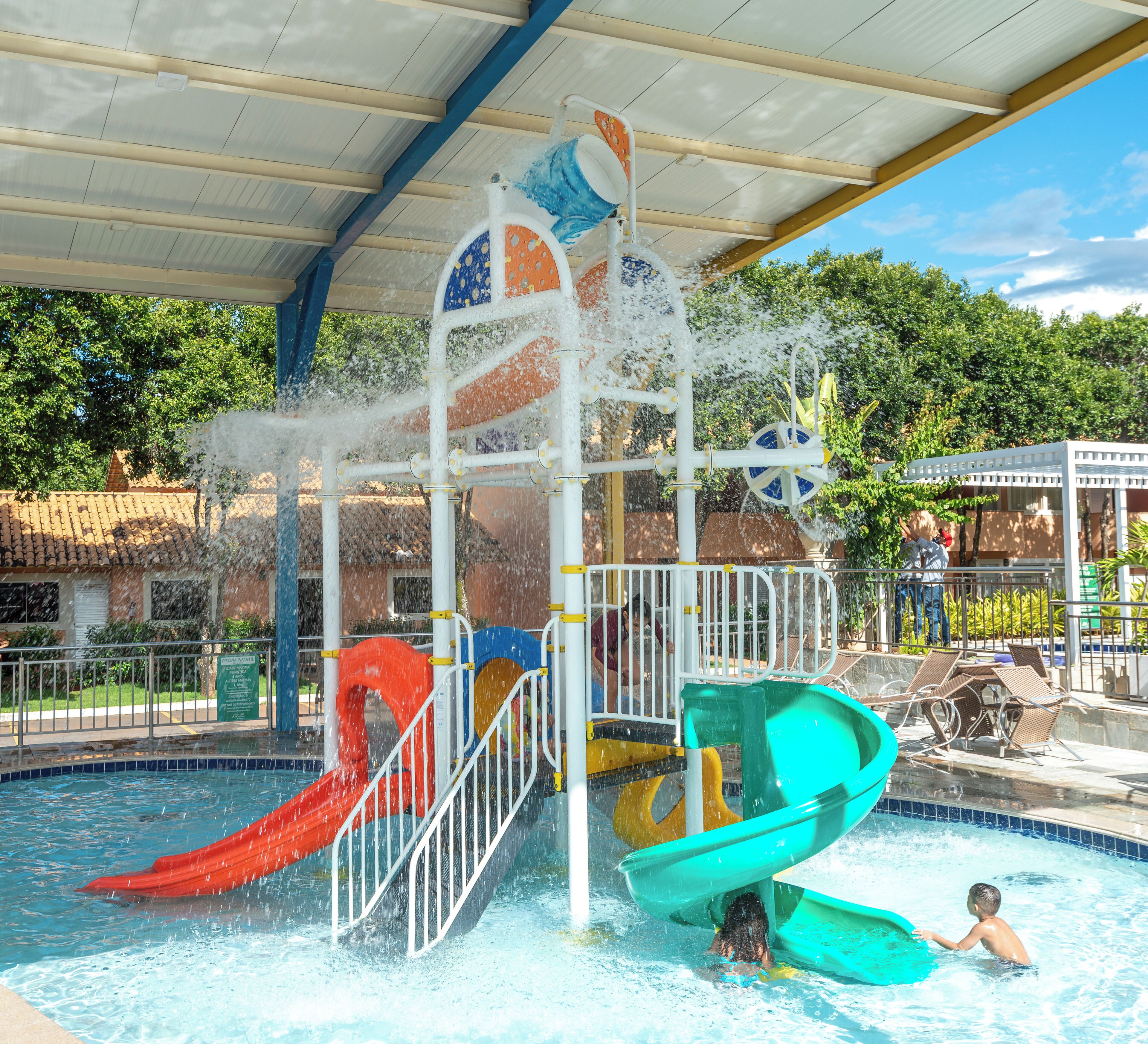 6 outdoor pools, a waterfall pool, pool umbrellas, pool loungers