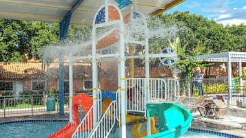 6 outdoor pools, a waterfall pool, pool umbrellas, pool loungers