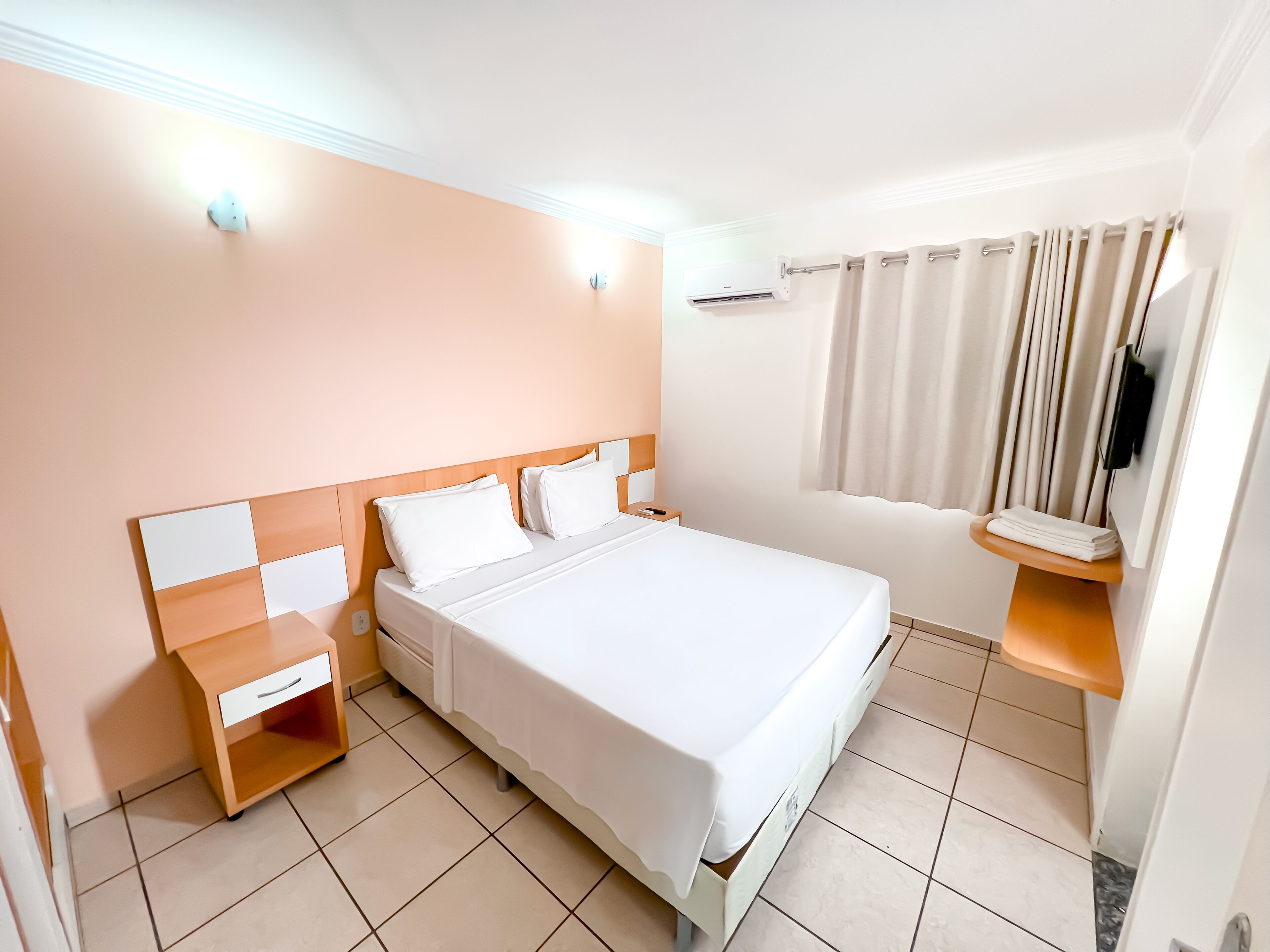 Standard Double Room | Minibar, in-room safe, desk, blackout drapes