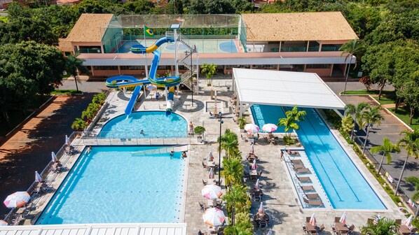 6 outdoor pools, a waterfall pool, pool umbrellas, sun loungers