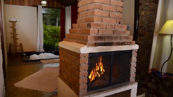 Chalé superior | Frigobar, roupa de cama
