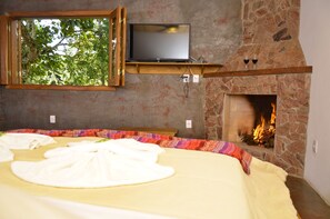 Suite Deluxe | Minibar, con stile personalizzato, lenzuola