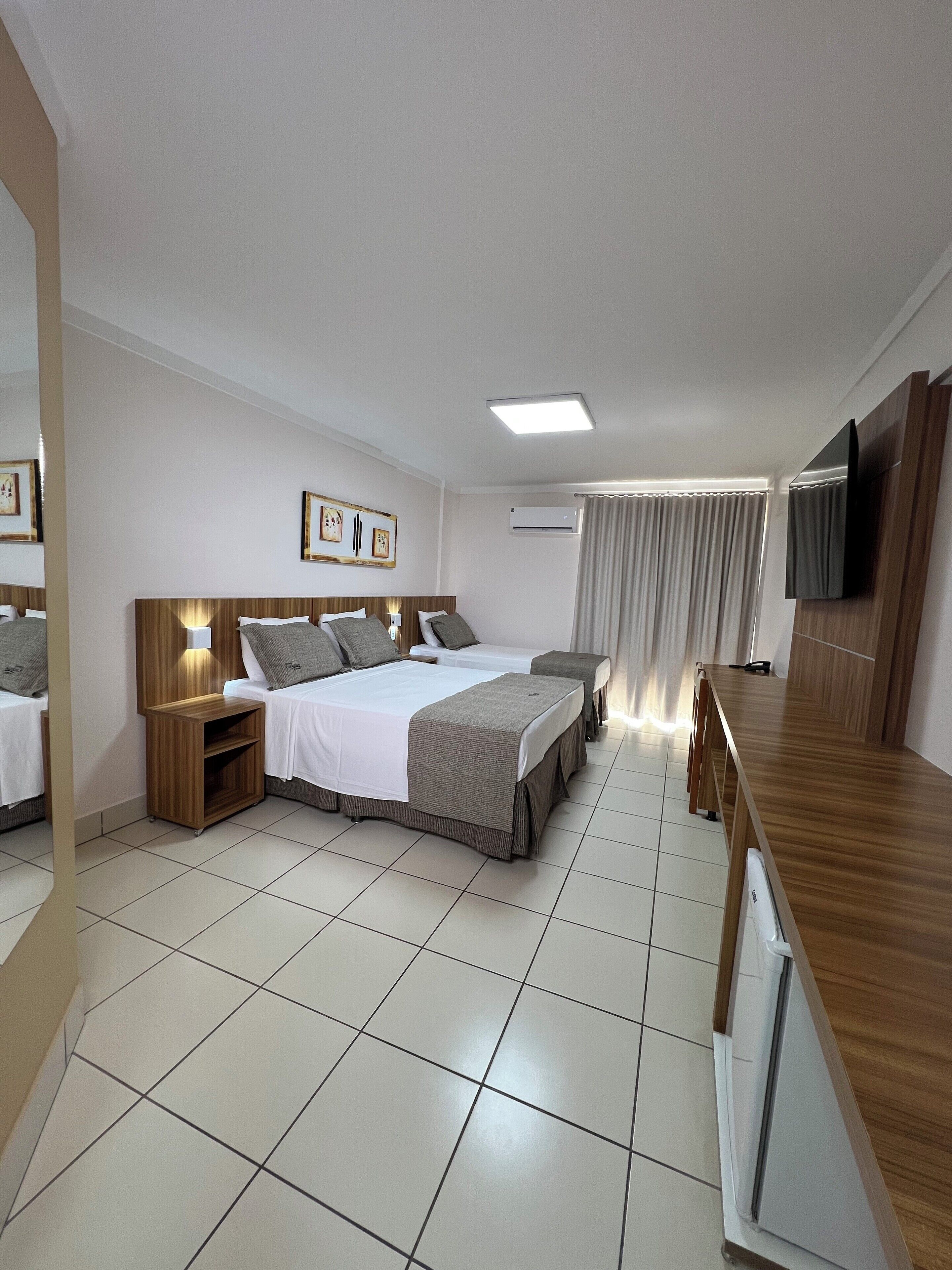 Standard Quadruple Room | Hypo-allergenic bedding, minibar, desk, blackout curtains