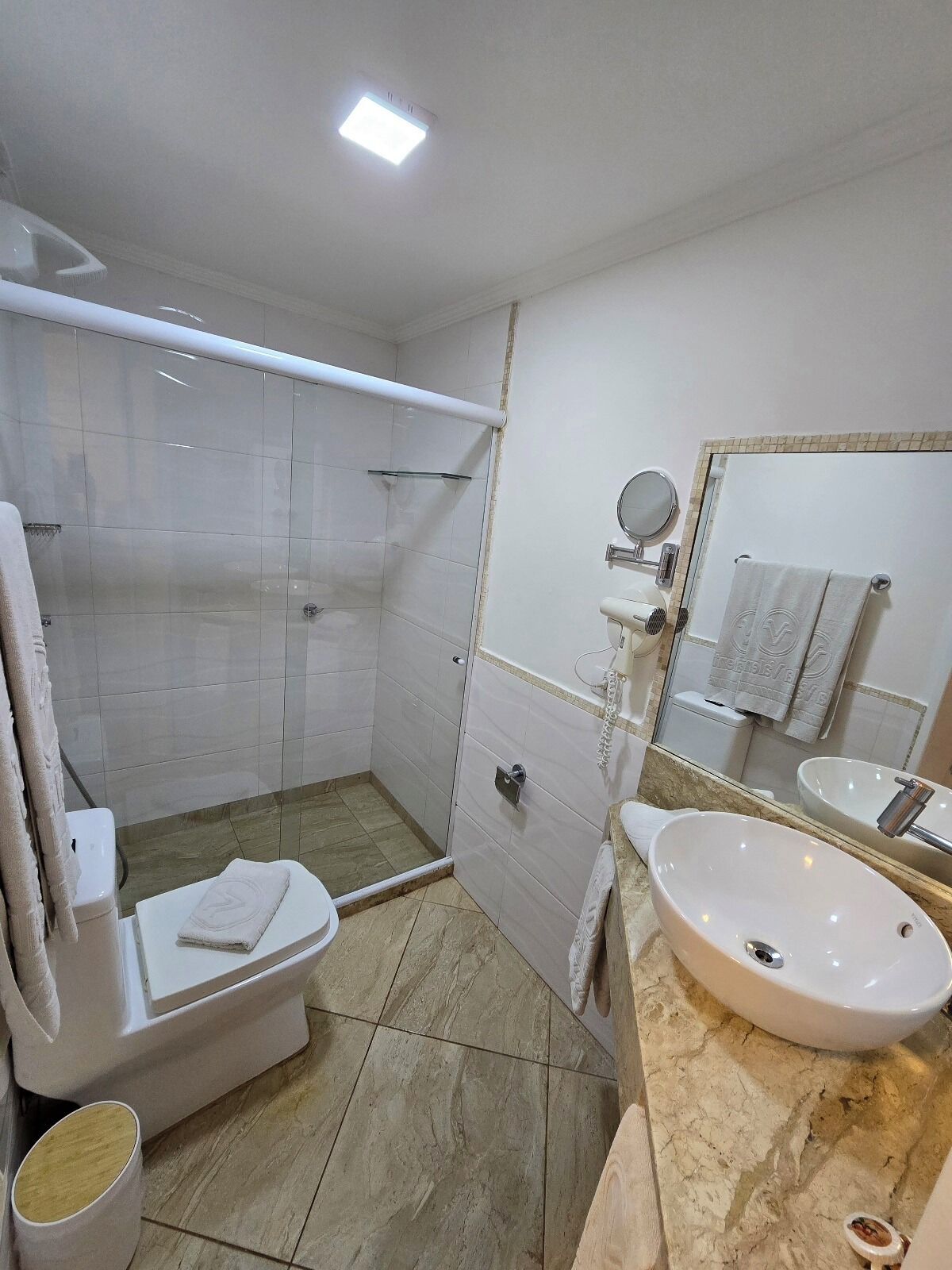 Shower, free toiletries, hair dryer, towels