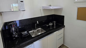 Mini-fridge, microwave, stovetop, blender