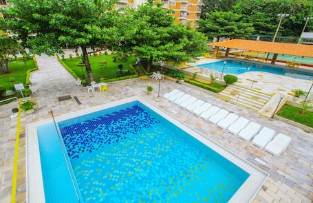 Indoor pool, outdoor pool, pool umbrellas, sun loungers