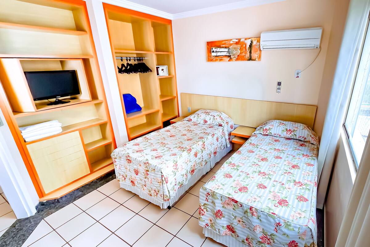 Standard Double Room | Minibar, in-room safe, desk, blackout drapes