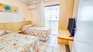 Standard Double Room | Minibar, in-room safe, desk, blackout drapes