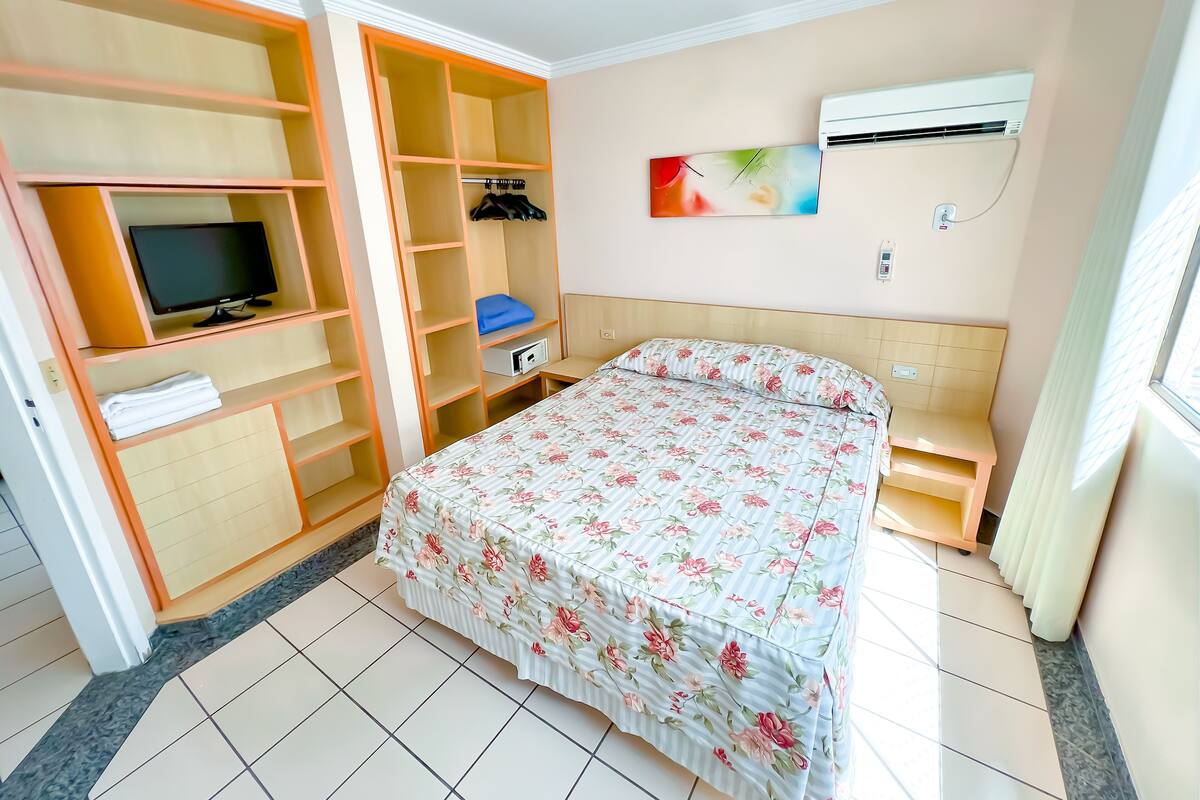 Standard Double Room | Minibar, in-room safe, desk, blackout drapes