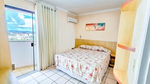 Standard Double Room | Minibar, in-room safe, desk, blackout drapes