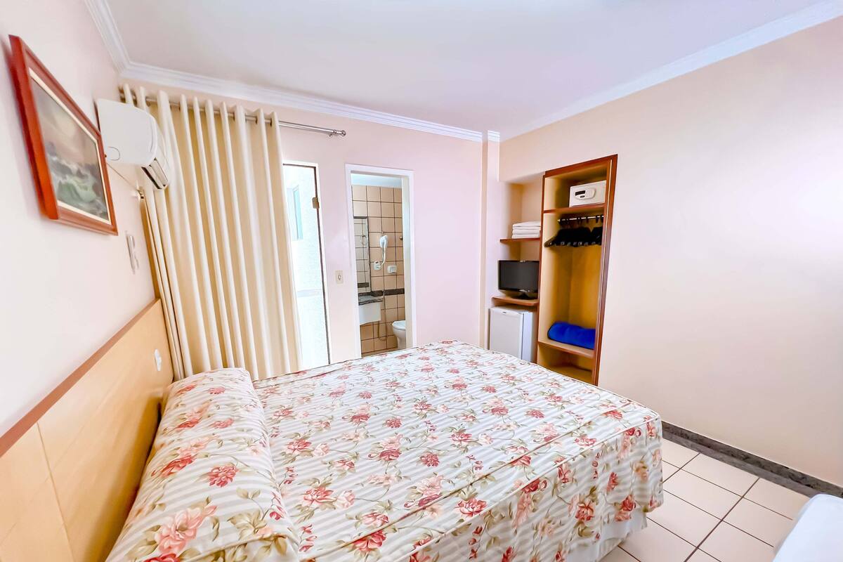 Standard Double Room | Minibar, in-room safe, desk, blackout drapes