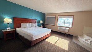 Deluxe Suite, 1 King Bed, Non Smoking | Premium bedding, desk, iron/ironing board, free WiFi