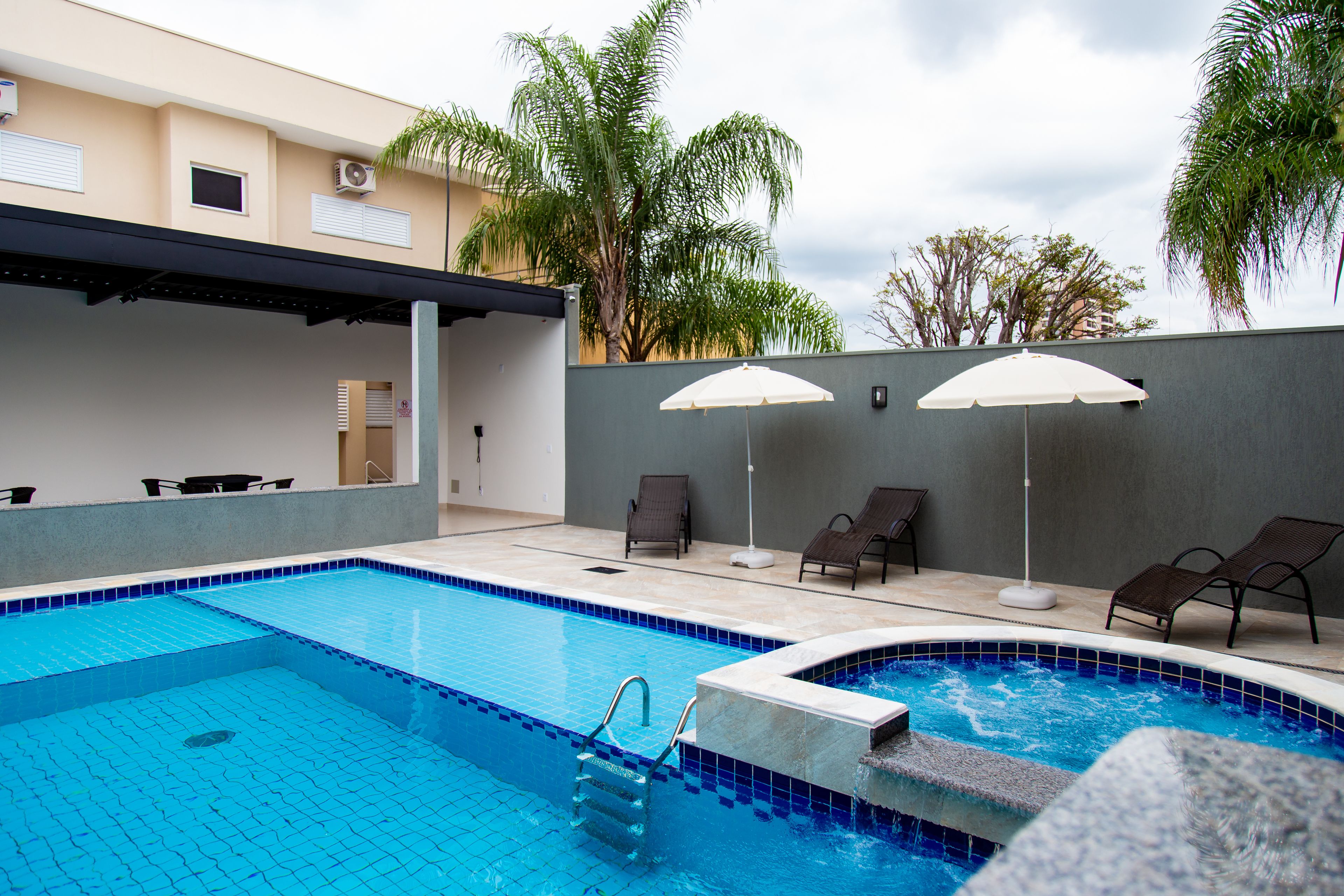 Indoor pool, open 9:00 AM to 10:00 PM, pool loungers