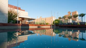 Outdoor pool, pool umbrellas, sun loungers