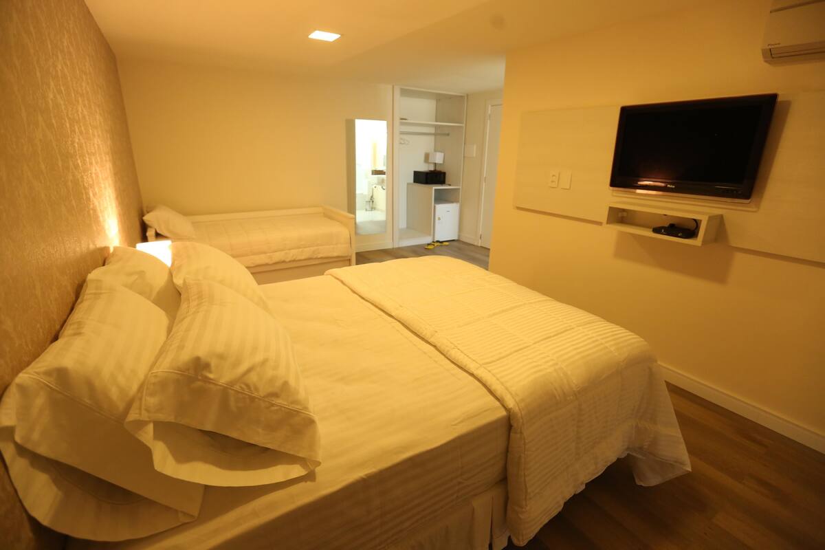 Comfort Triple Room, Balcony | Minibar, in-room safe, individually decorated, desk