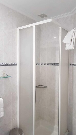 Shower, free toiletries, hair dryer, towels