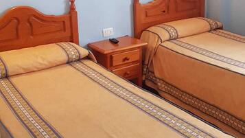 Desk, blackout drapes, rollaway beds, free WiFi