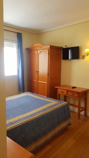 Desk, blackout drapes, rollaway beds, free WiFi