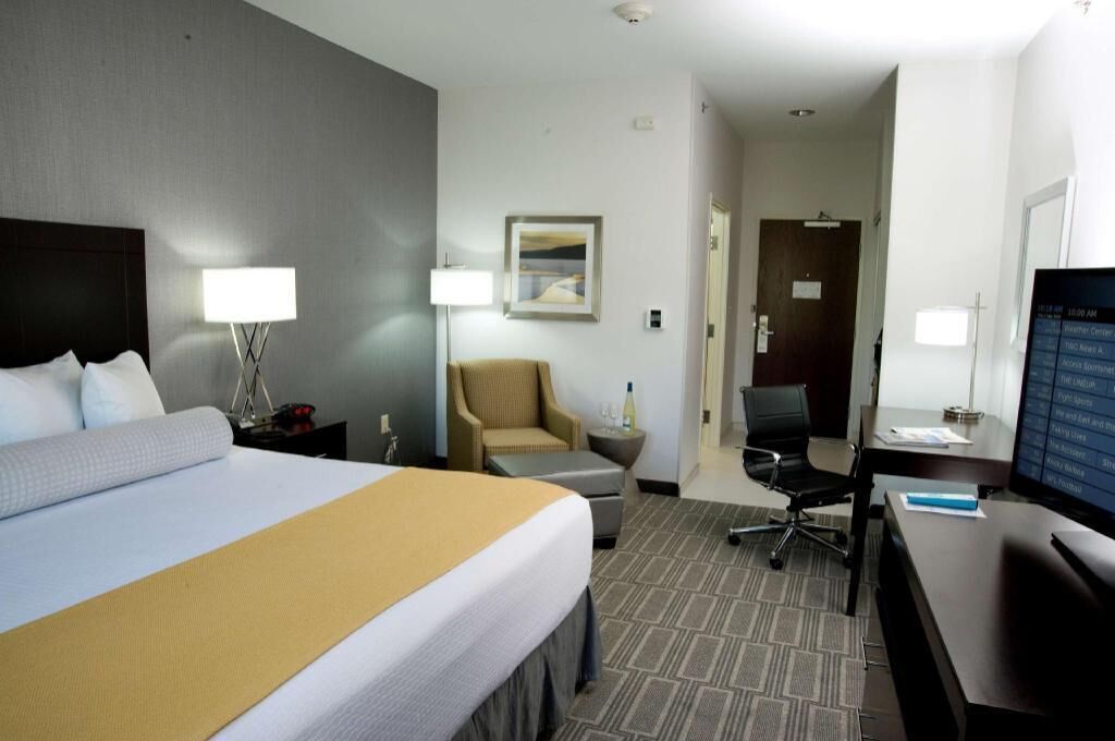 Hypo-allergenic bedding, pillowtop beds, desk, laptop workspace