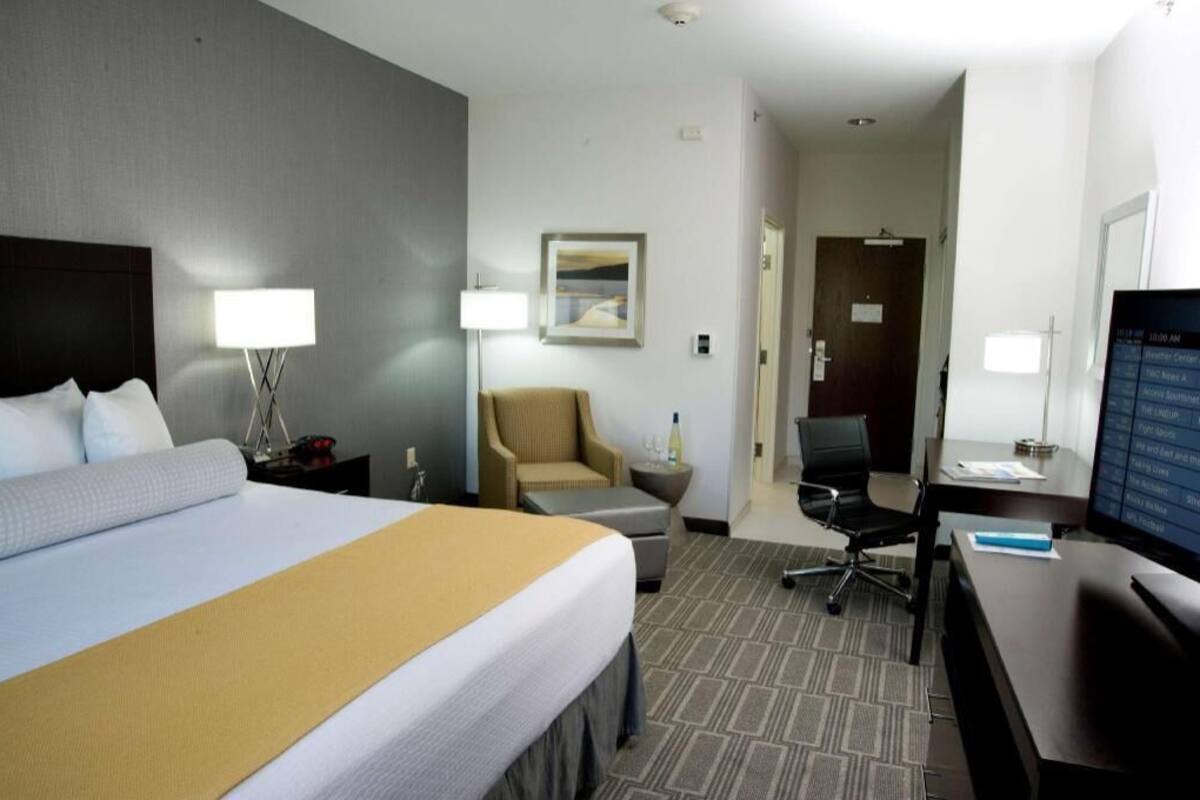 Hypo-allergenic bedding, pillowtop beds, desk, laptop workspace