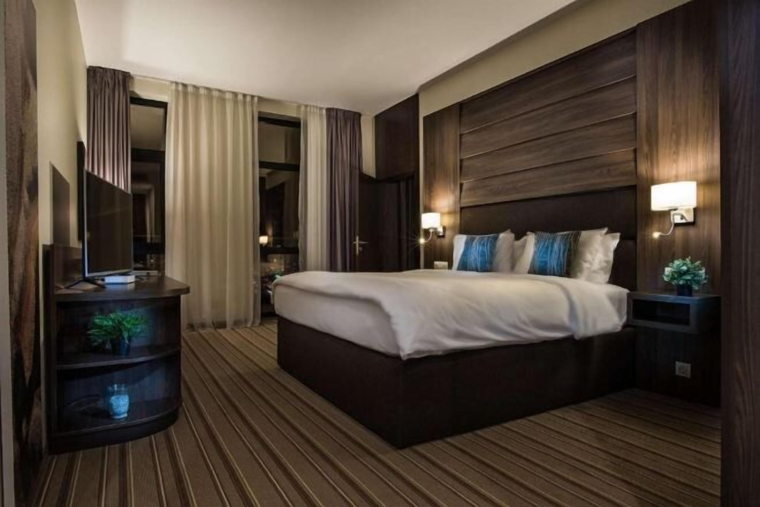 Premium bedding, memory-foam beds, minibar, in-room safe