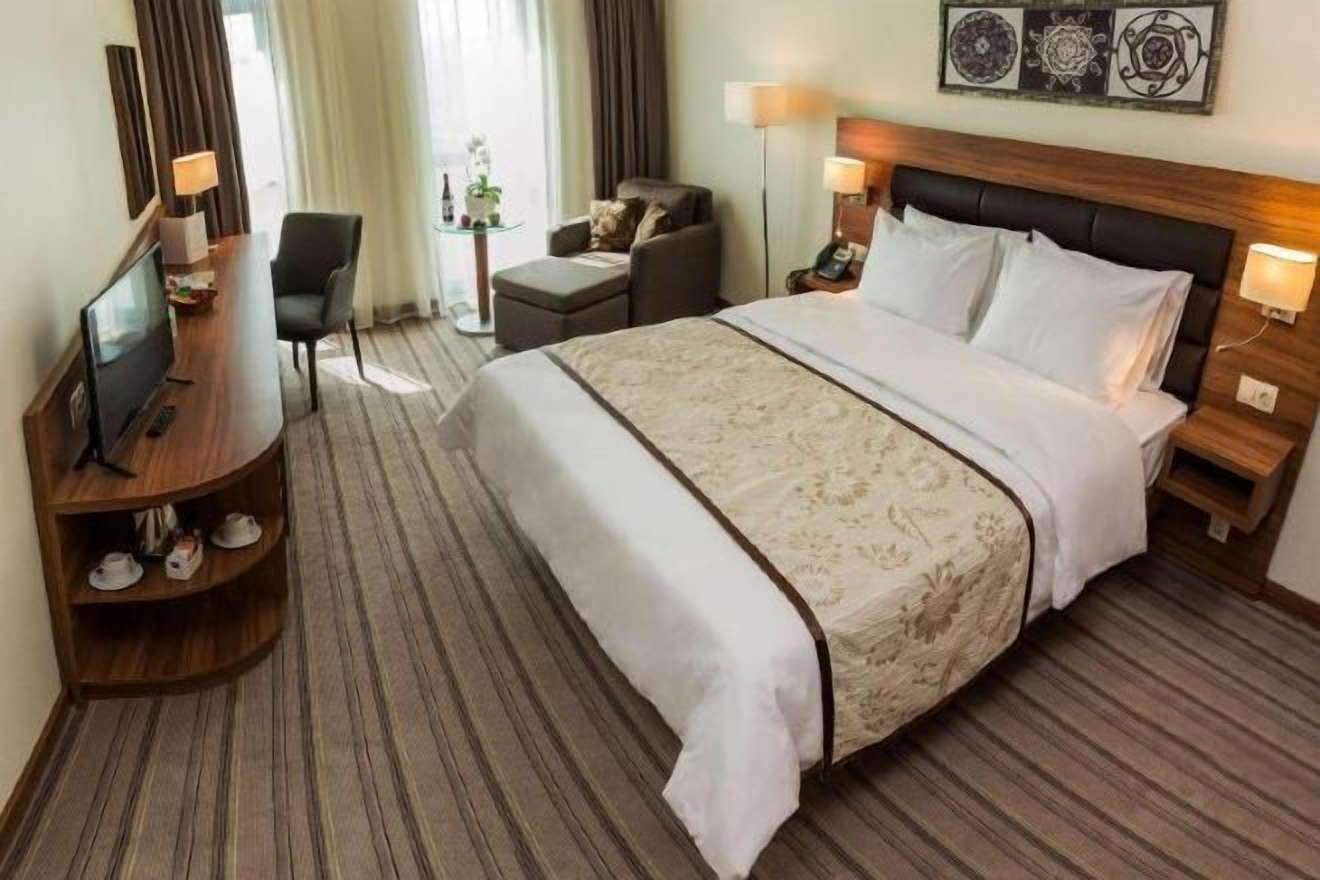 Premium bedding, memory-foam beds, minibar, in-room safe