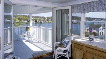 Deluxe Room, 1 King Bed, Harbor View | 1 bedroom, premium bedding, individually decorated