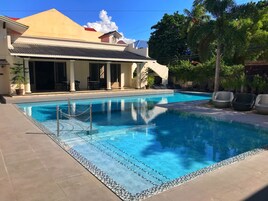 Outdoor pool, pool umbrellas, sun loungers