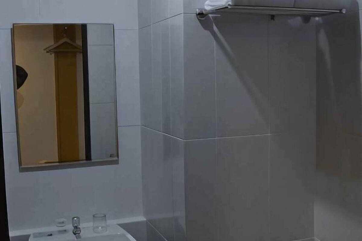 Bathroom | Shower, slippers, towels