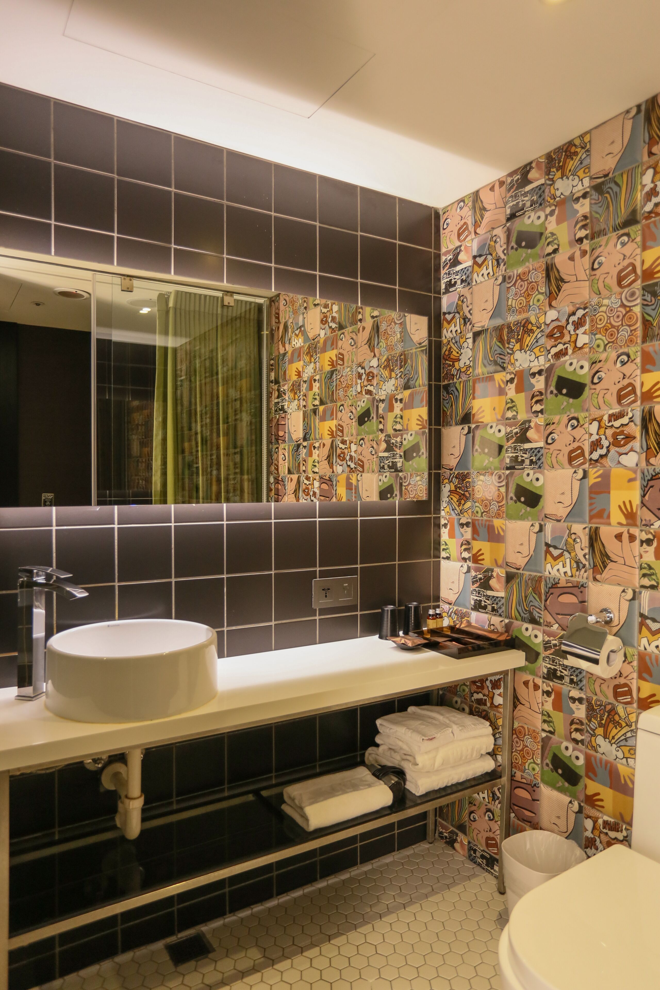 shower, hair dryer, towels, toilet paper