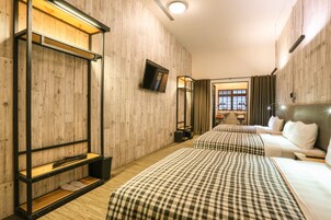 Deluxe Family Room (6 adults), No Windows | 1 bedroom, premium bedding, down comforters, minibar