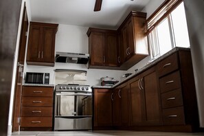 Luxury Apartment, 3 Bedrooms, Accessible, Pool Access | Private kitchen | Fridge, microwave, stovetop, dishwasher