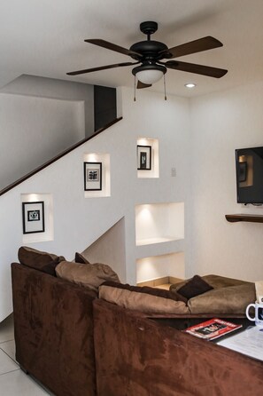 Luxury Apartment, 2 Bedrooms, Balcony, Pool View | Living room | Flat-screen TV