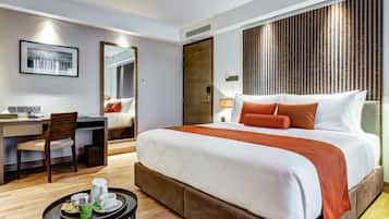 Biancheria da letto di alta qualità, materassi a doppio strato, minibar