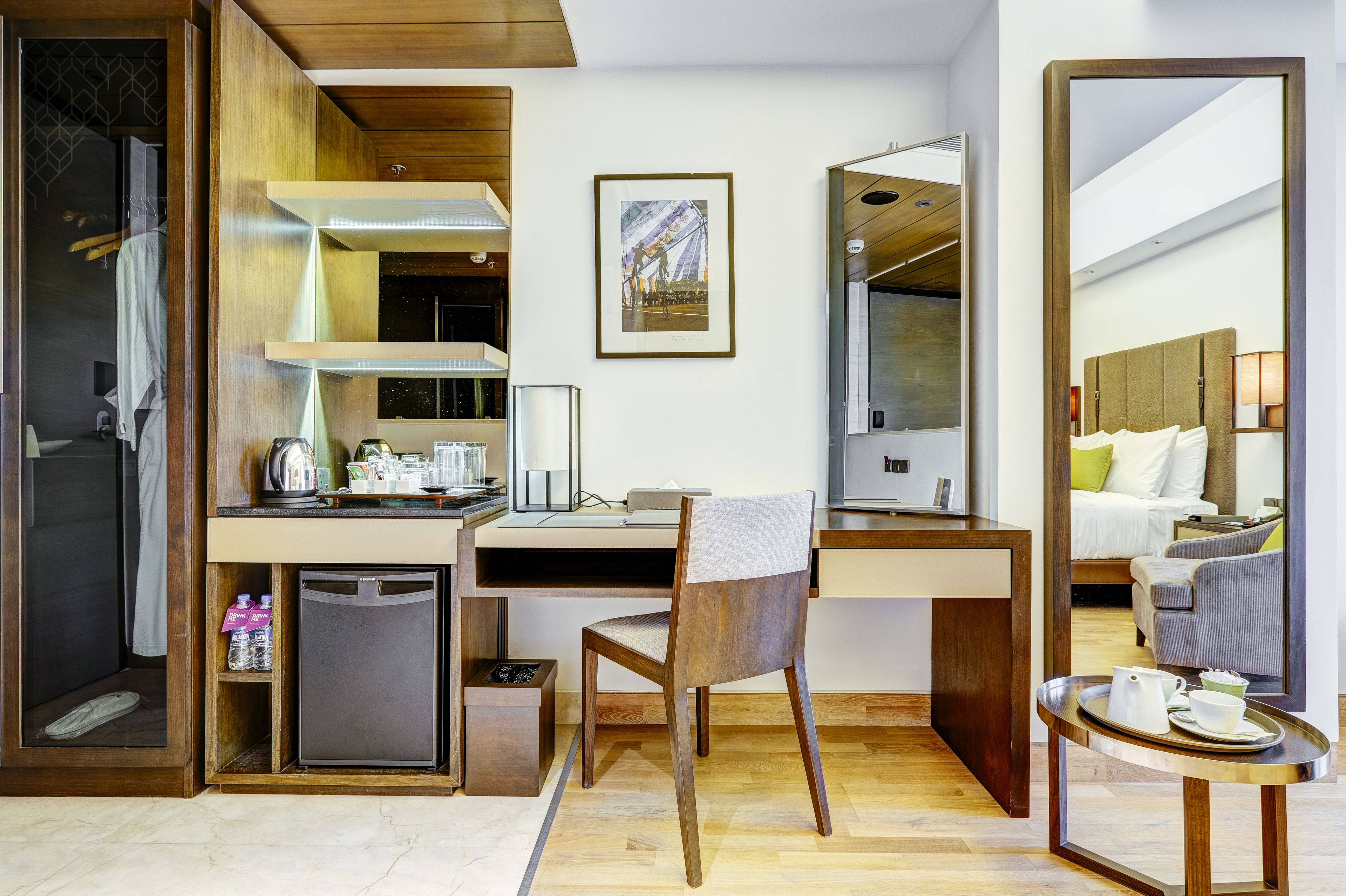 deluxe single room, 1 queen bed | living area | led tv, pay films