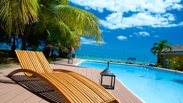 Outdoor pool, pool umbrellas, sun loungers