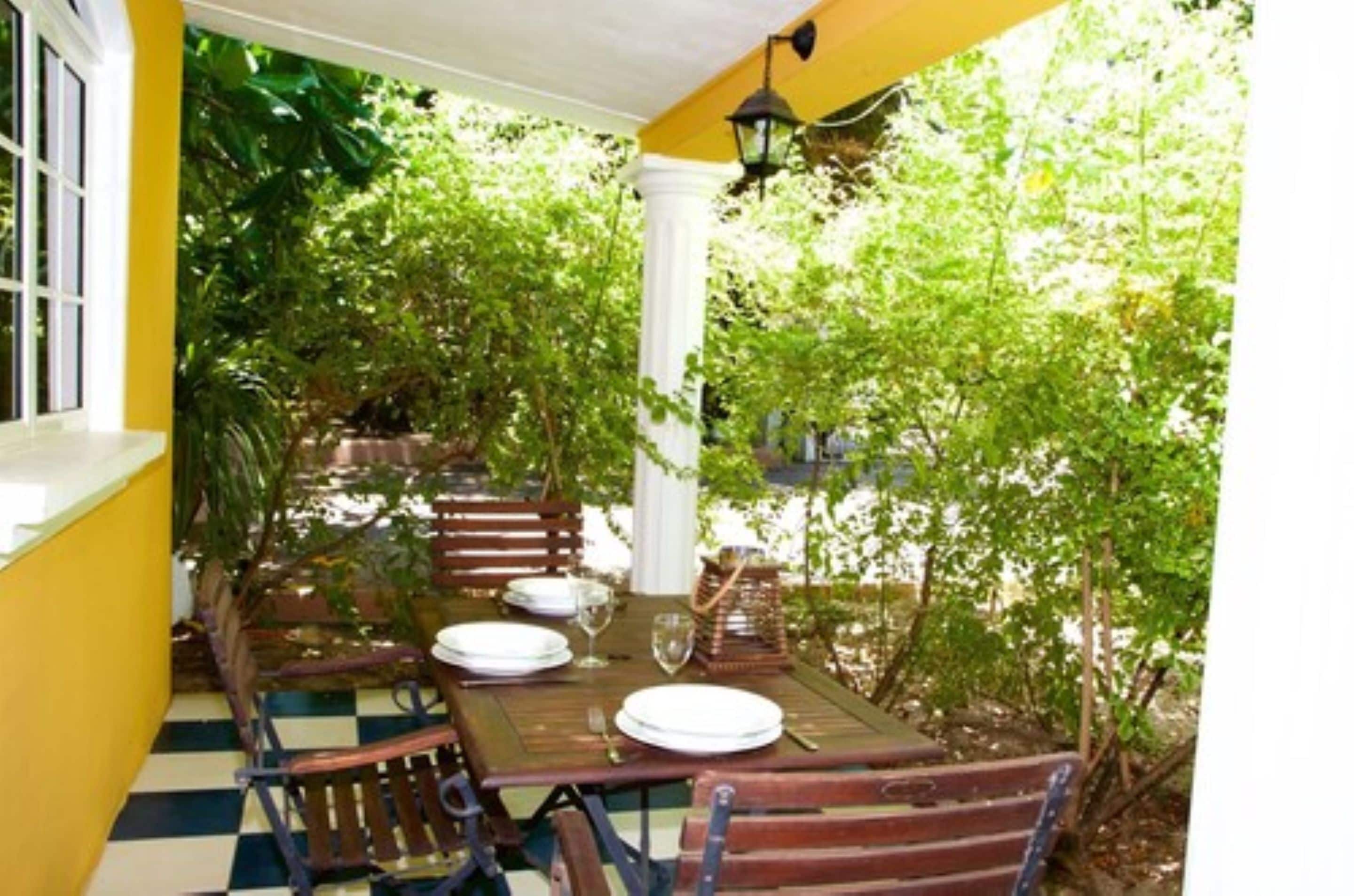 Family Bungalow, Kitchenette, Garden View | Breakfast area | Free daily English breakfast